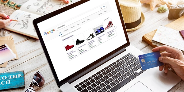 Person browsing an online shopping website on a laptop, representing the topic of free Google product listings