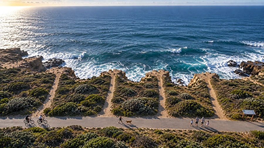 Aerial view of an Australian coastal lookout where four side paths lead straight to the cliff edge